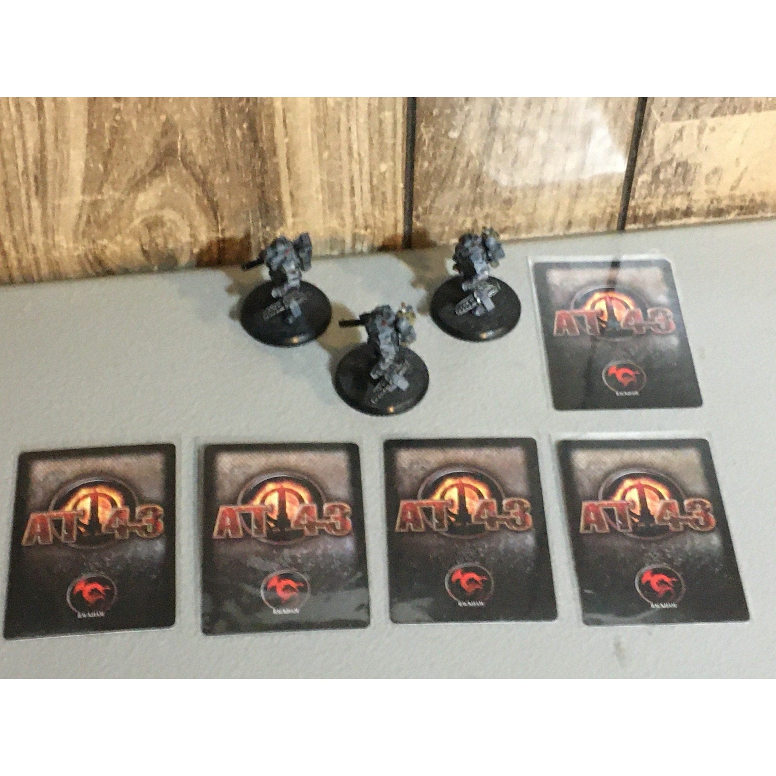 A33511 RACKHAM AT-43 UNA DEATH DEALER TACARM 3 PK MINIATURES W CARDS