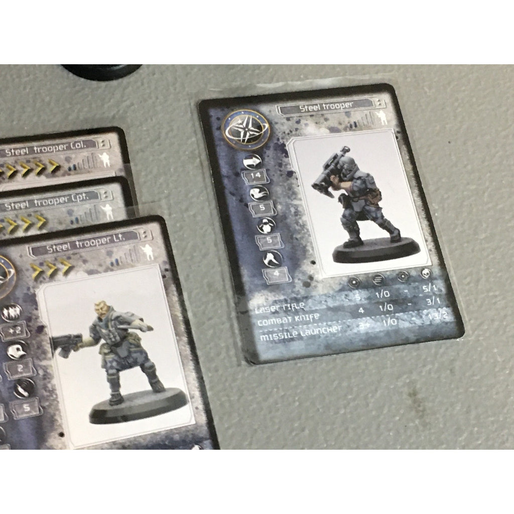 A33529 RACKHAM AT-43 UNA STEEL TROOPERS 7 PK MINIATURES W CARDS