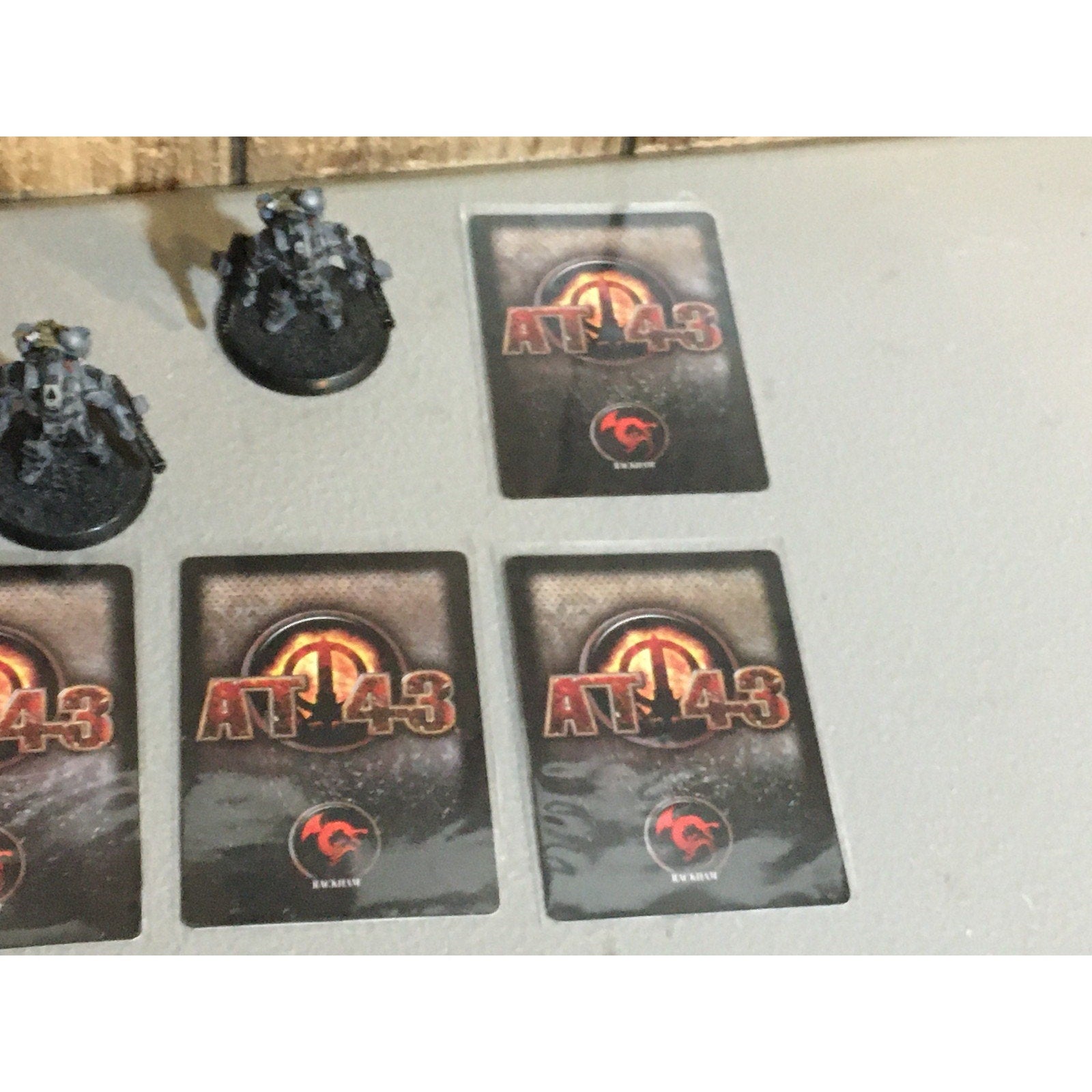 A33511 RACKHAM AT-43 UNA DEATH DEALER TACARM 3 PK MINIATURES W CARDS