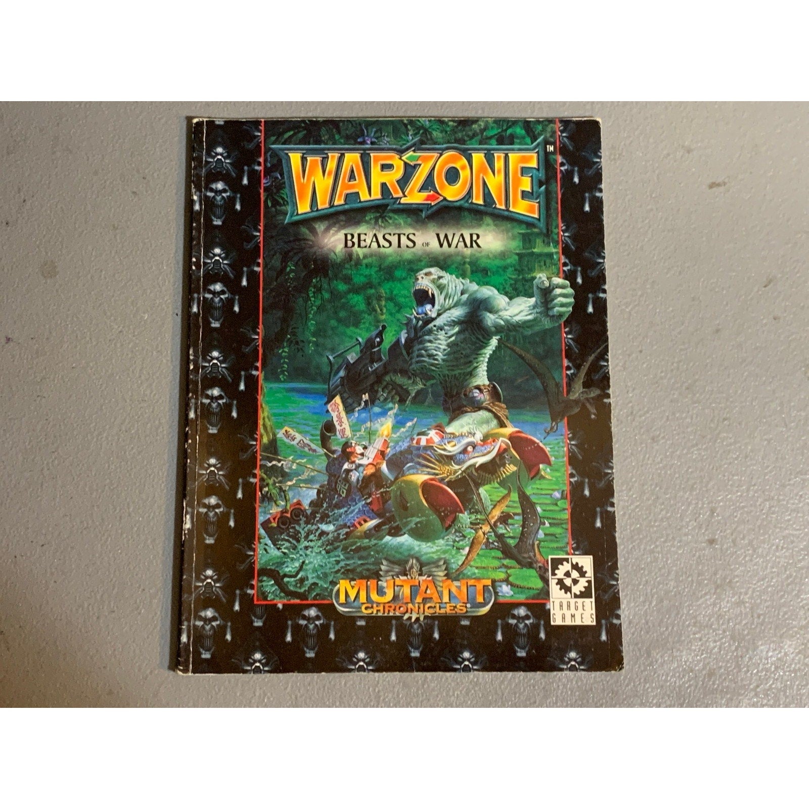 A31649 WARZONE MUTANT CHRON HHG ARMY BOOK PLAYED COMPENDIUM VOL. 2 BEASTS OF WAR