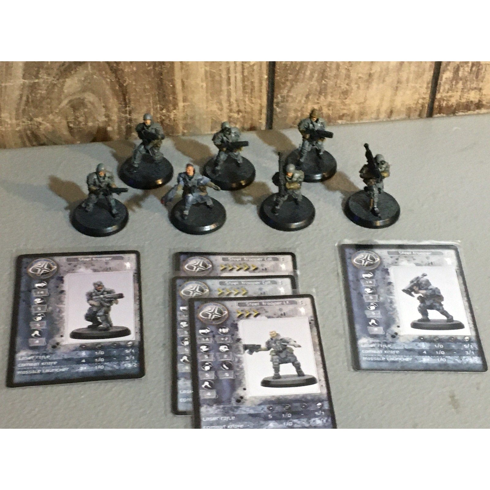 A33529 RACKHAM AT-43 UNA STEEL TROOPERS 7 PK MINIATURES W CARDS
